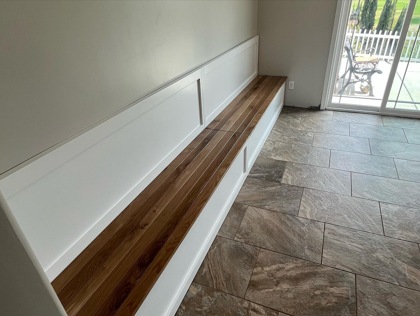 Featured image for “White Oak custom banquette seating with maple interiors”